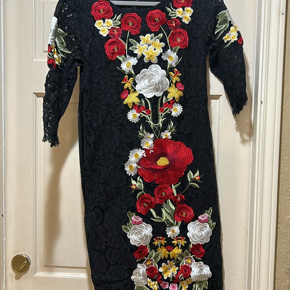 Lace with slip and embroidery